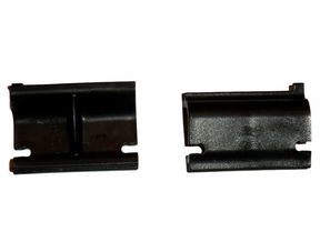 A pair of black Thetford fridge vent locking clips.
